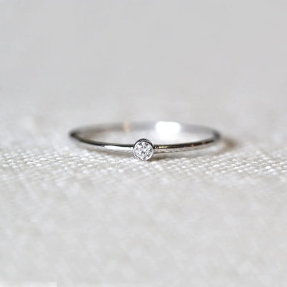 Tiny Diamond Engagement Ring
