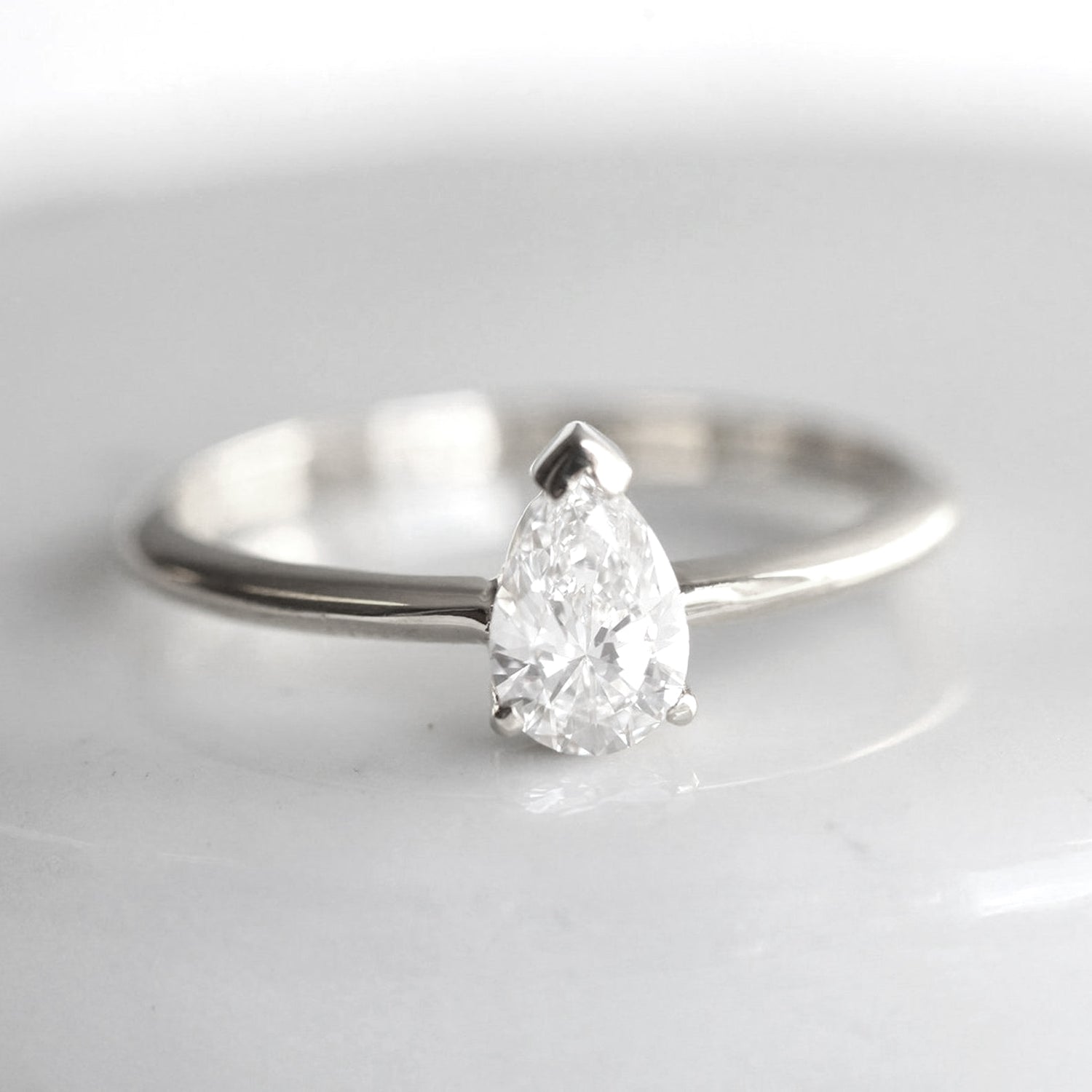 Pear Cut Diamond Engagement Ring in Platinum.